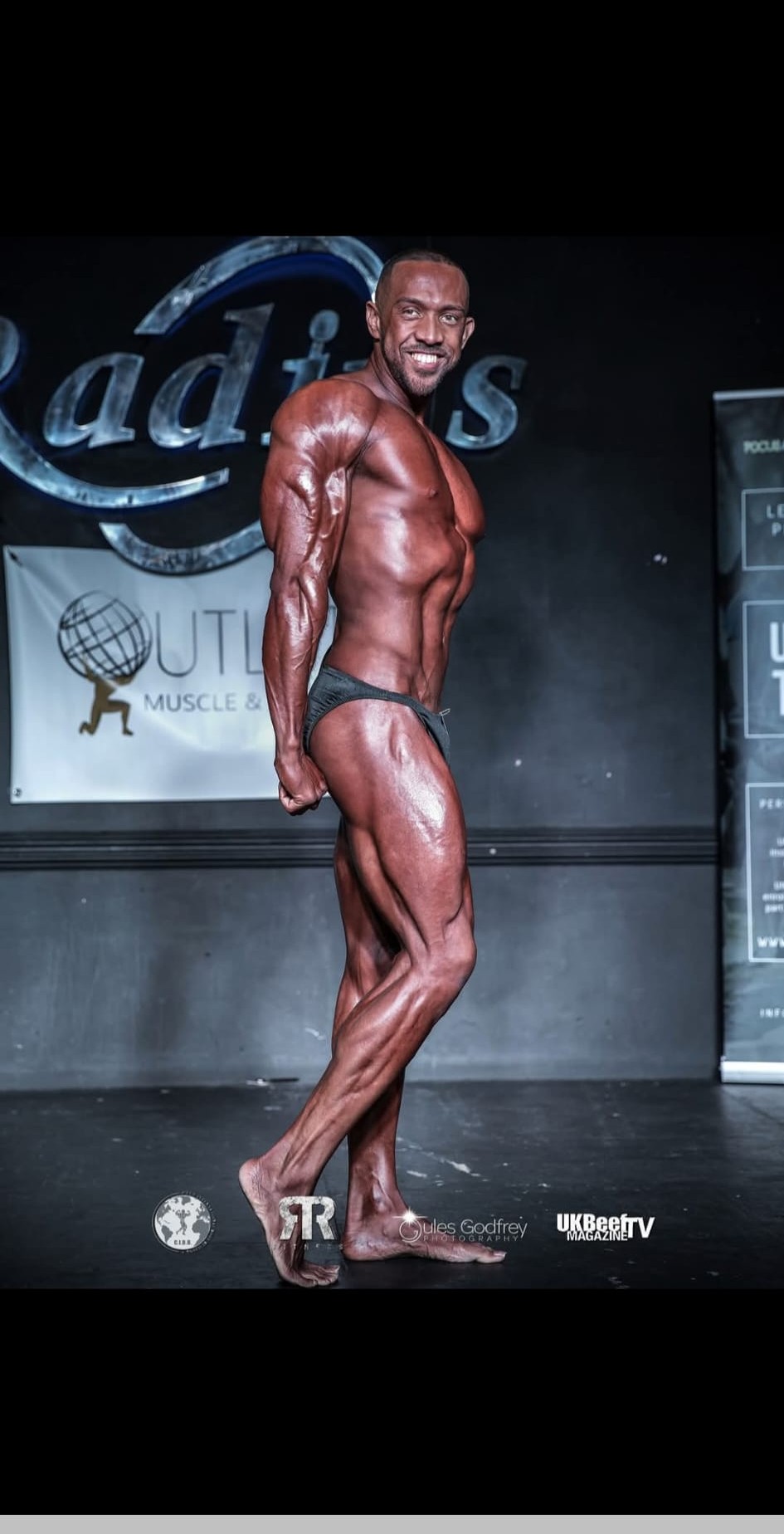 Josh side tricep pose at Radius competition