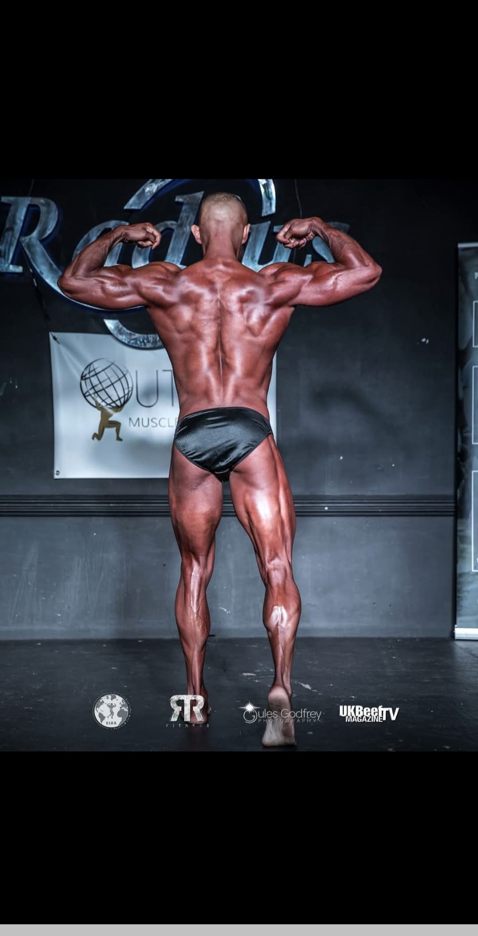 Josh back double biceps at Radius competition